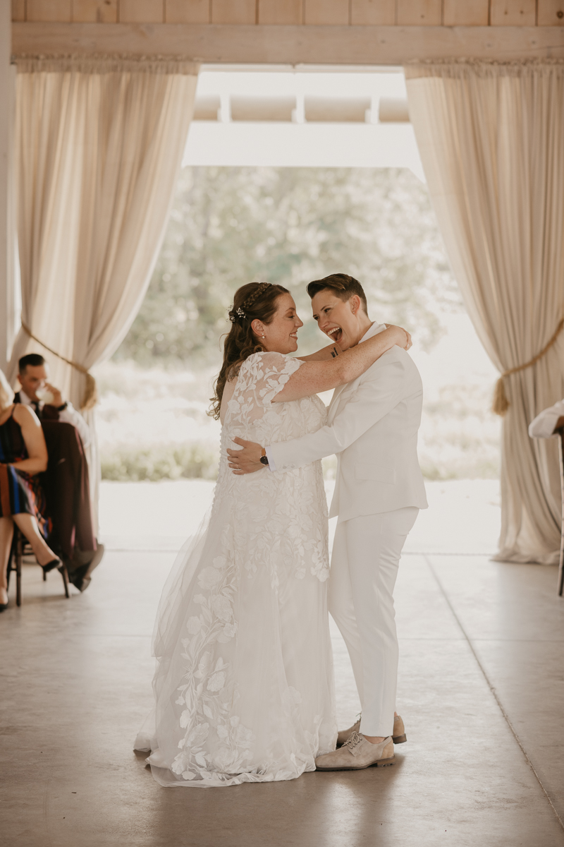 A fun wedding reception at Kylan Barn in Delmar, Maryland by Britney Clause Photography