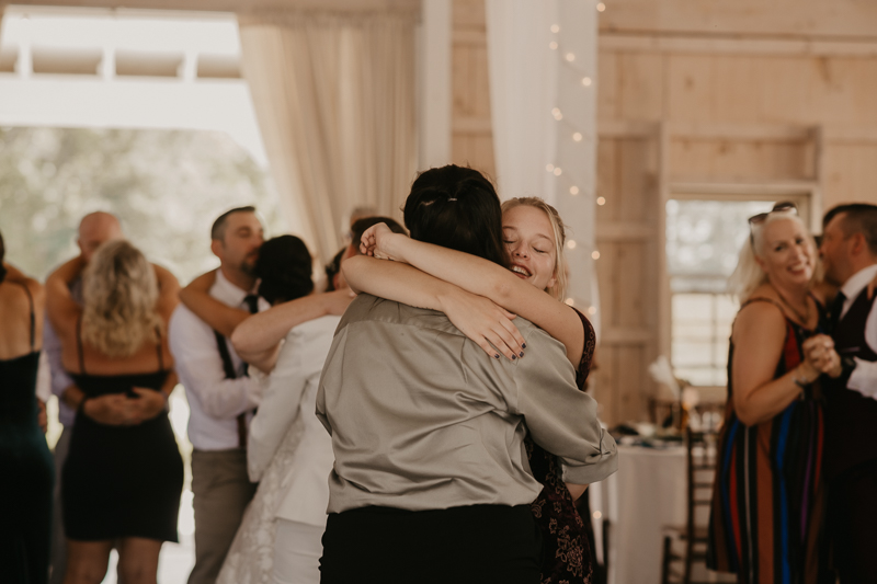 A fun wedding reception at Kylan Barn in Delmar, Maryland by Britney Clause Photography