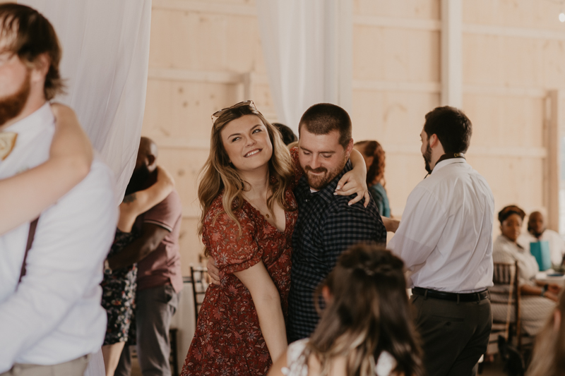 A fun wedding reception at Kylan Barn in Delmar, Maryland by Britney Clause Photography