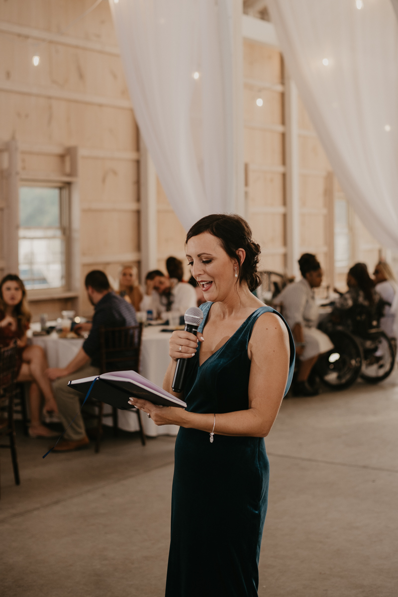 A fun wedding reception at Kylan Barn in Delmar, Maryland by Britney Clause Photography