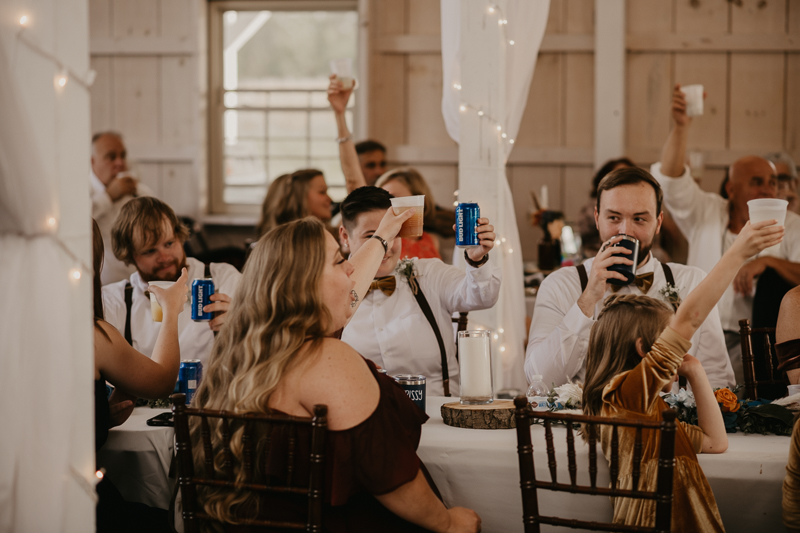 A fun wedding reception at Kylan Barn in Delmar, Maryland by Britney Clause Photography