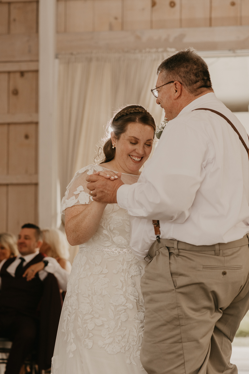 A fun wedding reception at Kylan Barn in Delmar, Maryland by Britney Clause Photography