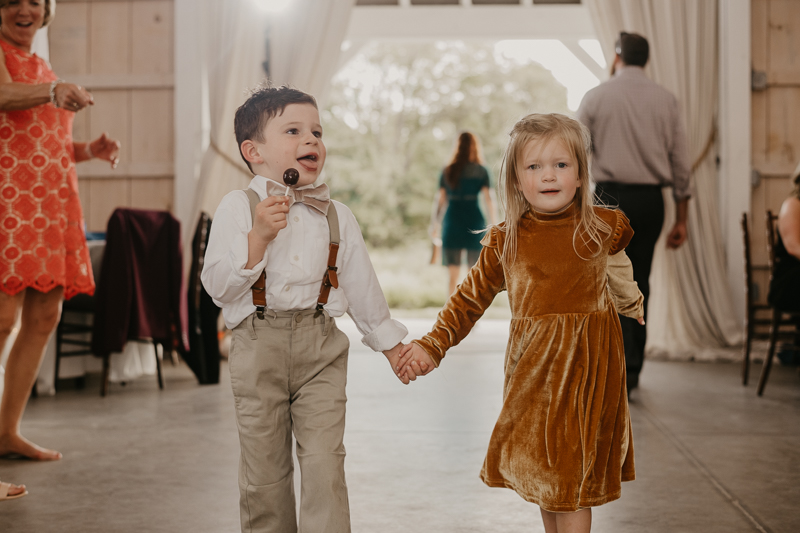 A fun wedding reception at Kylan Barn in Delmar, Maryland by Britney Clause Photography