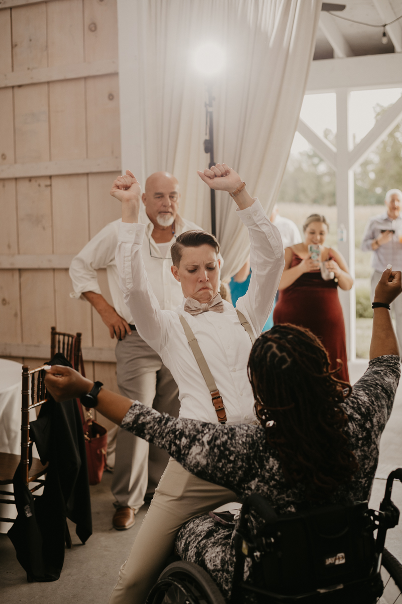 A fun wedding reception at Kylan Barn in Delmar, Maryland by Britney Clause Photography