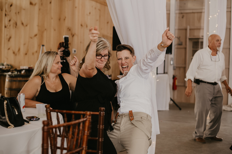 A fun wedding reception at Kylan Barn in Delmar, Maryland by Britney Clause Photography