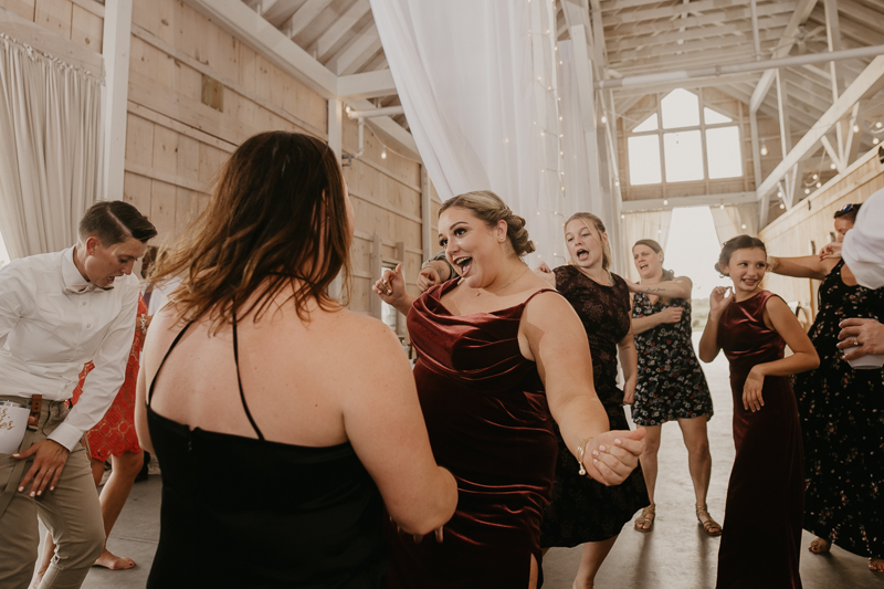 A fun wedding reception at Kylan Barn in Delmar, Maryland by Britney Clause Photography