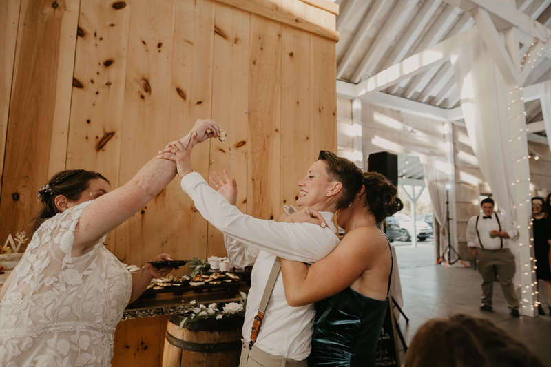 A fun wedding reception at Kylan Barn in Delmar, Maryland by Britney Clause Photography