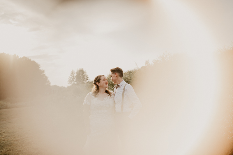 Stunning bride and bride sunset wedding portraits at Kylan Barn in Delmar, Maryland by Britney Clause Photography