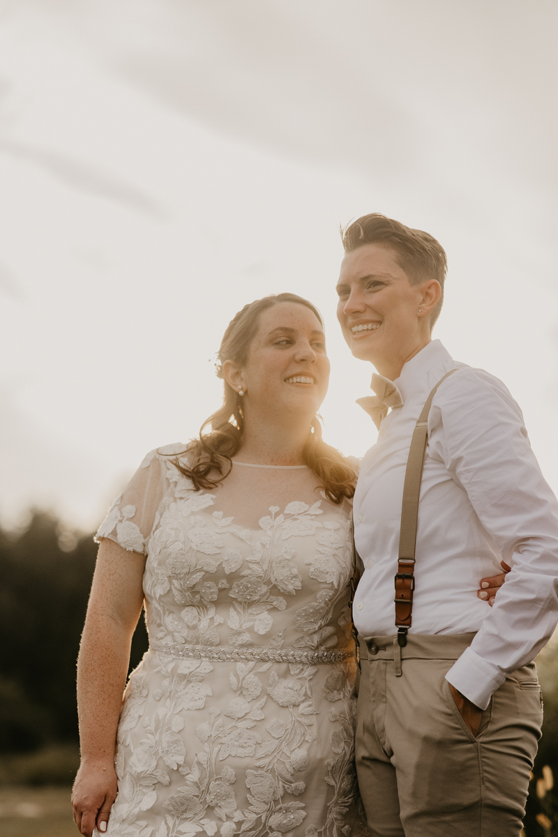 Stunning bride and bride sunset wedding portraits at Kylan Barn in Delmar, Maryland by Britney Clause Photography