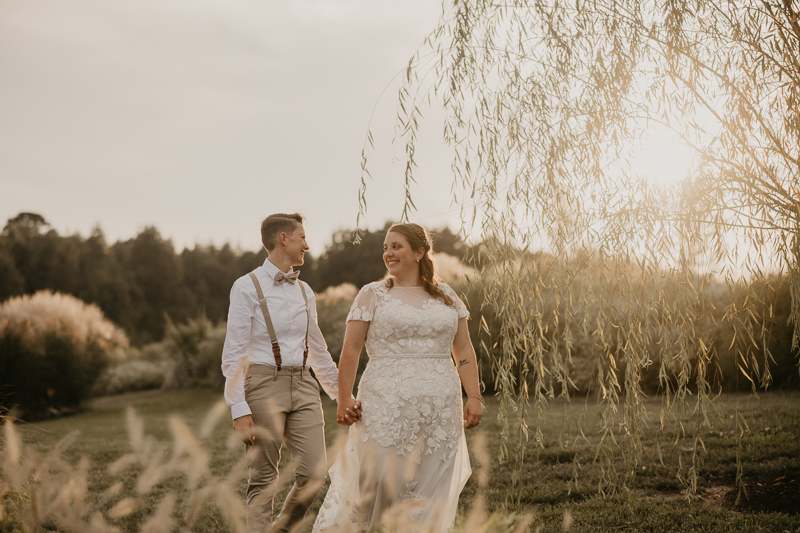 Stunning bride and bride sunset wedding portraits at Kylan Barn in Delmar, Maryland by Britney Clause Photography