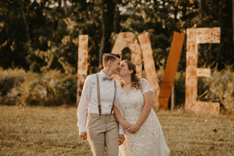 Stunning bride and bride sunset wedding portraits at Kylan Barn in Delmar, Maryland by Britney Clause Photography