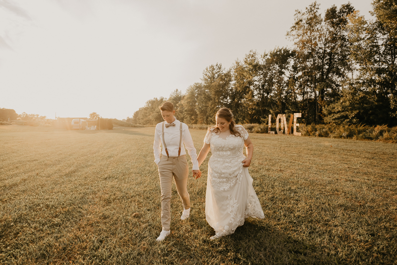 Stunning bride and bride sunset wedding portraits at Kylan Barn in Delmar, Maryland by Britney Clause Photography