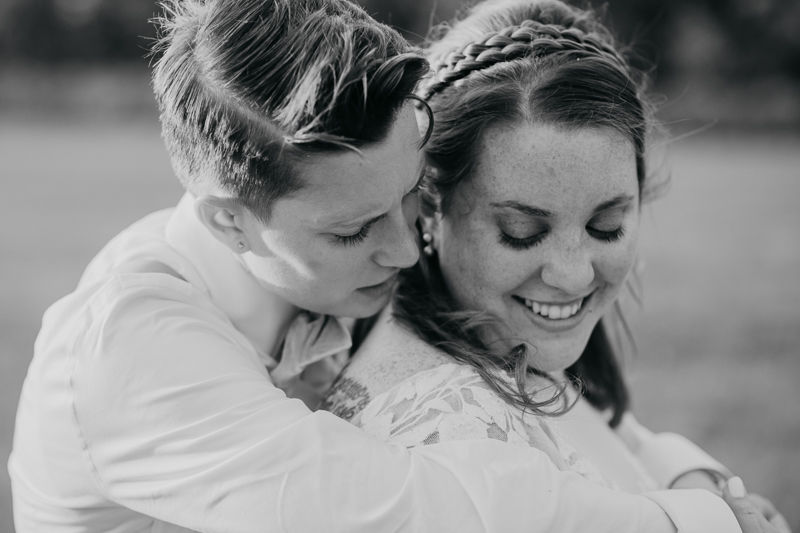 Stunning bride and bride sunset wedding portraits at Kylan Barn in Delmar, Maryland by Britney Clause Photography