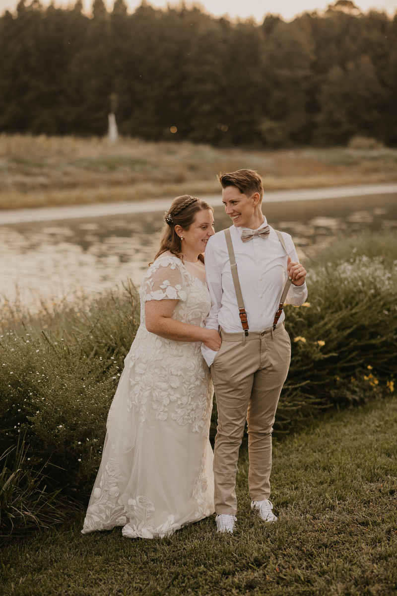 Stunning bride and bride sunset wedding portraits at Kylan Barn in Delmar, Maryland by Britney Clause Photography