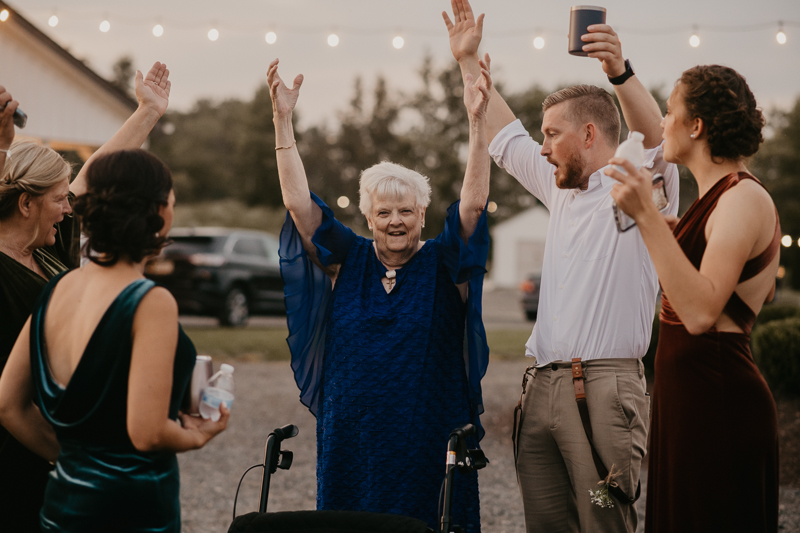 A fun wedding reception at Kylan Barn in Delmar, Maryland by Britney Clause Photography