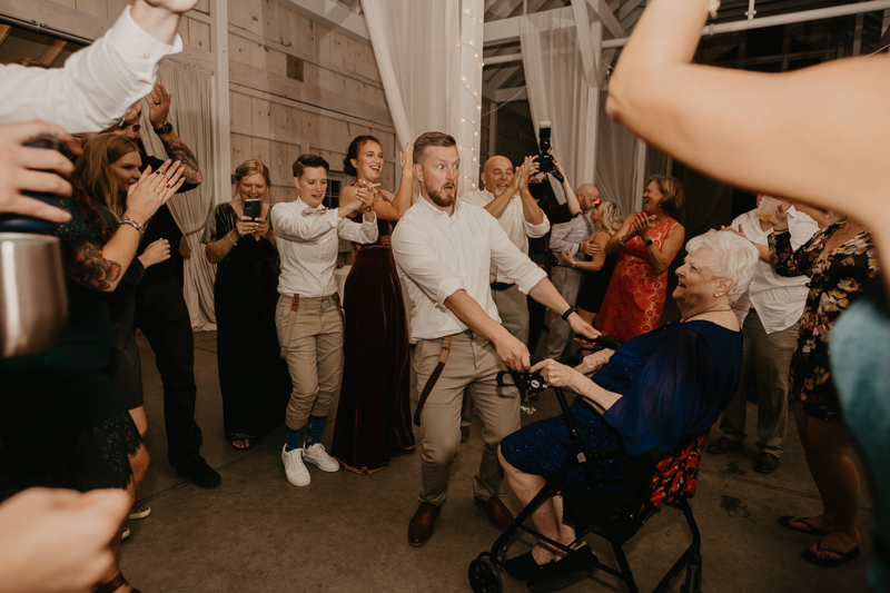 A fun wedding reception at Kylan Barn in Delmar, Maryland by Britney Clause Photography