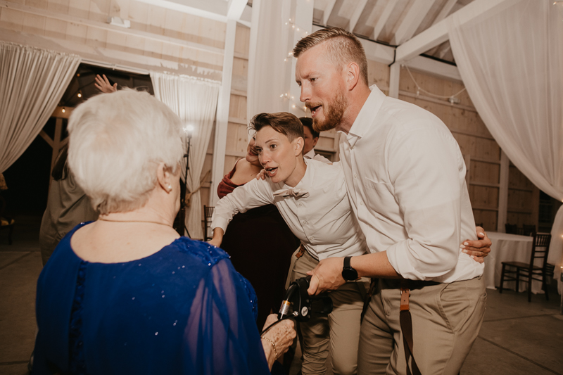 A fun wedding reception at Kylan Barn in Delmar, Maryland by Britney Clause Photography