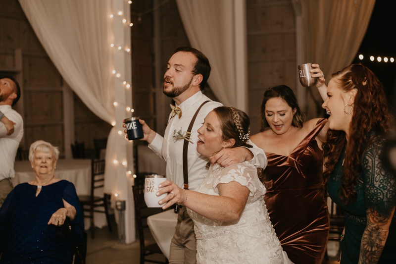 A fun wedding reception at Kylan Barn in Delmar, Maryland by Britney Clause Photography