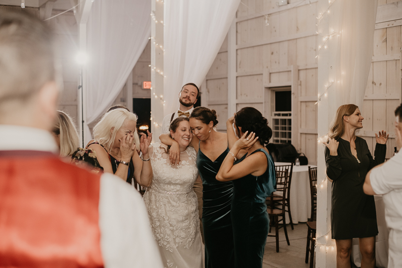 A fun wedding reception at Kylan Barn in Delmar, Maryland by Britney Clause Photography