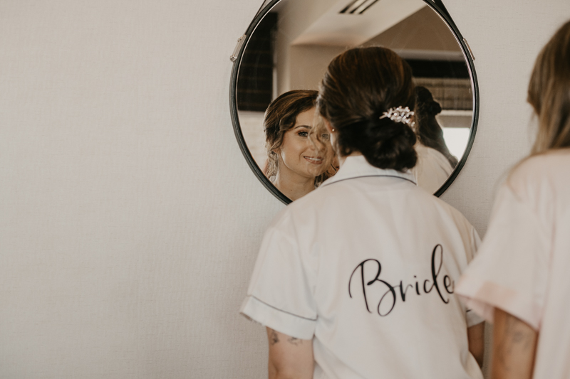 A bride getting ready for her wedding at The Hyatt Regency Chesapeake Bay, Maryland by Britney Clause Photography