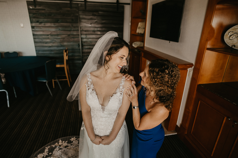 A bride getting ready for her wedding at The Hyatt Regency Chesapeake Bay, Maryland by Britney Clause Photography