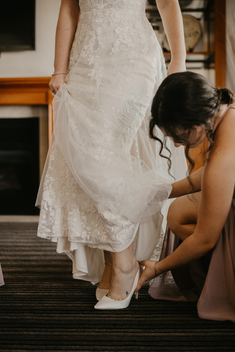 A bride getting ready for her wedding at The Hyatt Regency Chesapeake Bay, Maryland by Britney Clause Photography