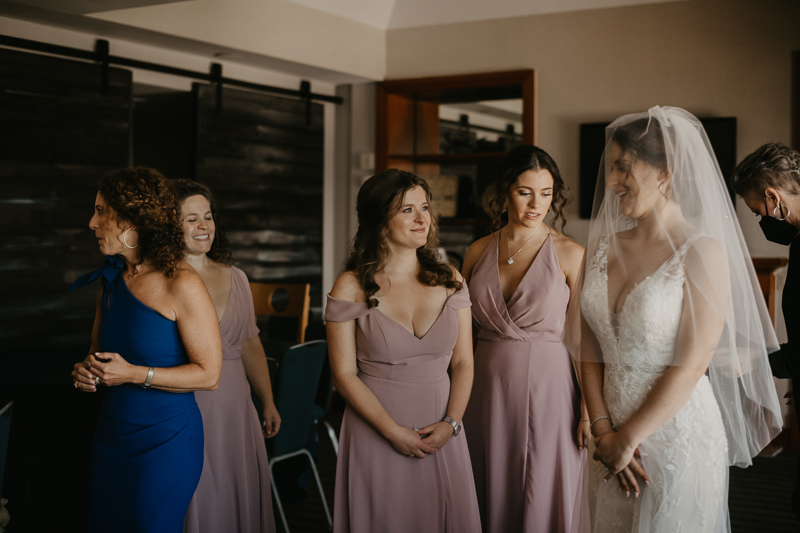 A bride getting ready for her wedding at The Hyatt Regency Chesapeake Bay, Maryland by Britney Clause Photography