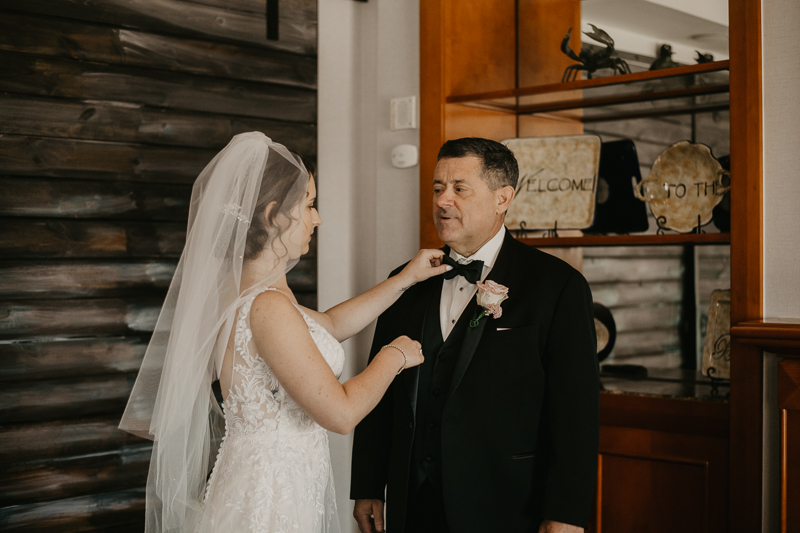 A bride getting ready for her wedding at The Hyatt Regency Chesapeake Bay, Maryland by Britney Clause Photography