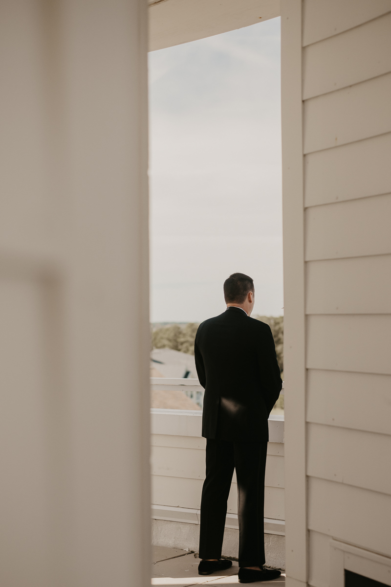 Stunning bride and groom first look in the Raven's View at The Hyatt Regency Chesapeake Bay, Maryland by Britney Clause Photography