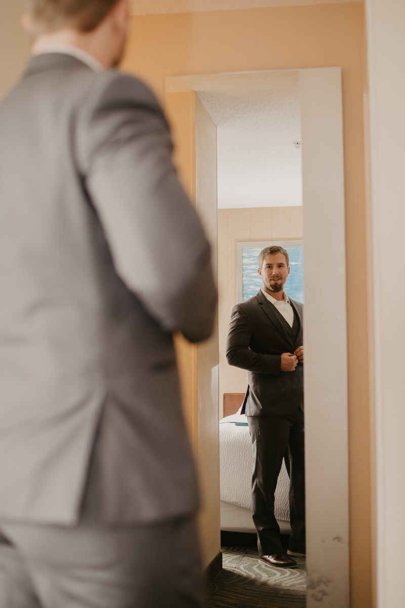 A groom getting ready for his wedding at the Vineyards of Mary's Meadow in Darlington, Maryland by Britney Clause Photography