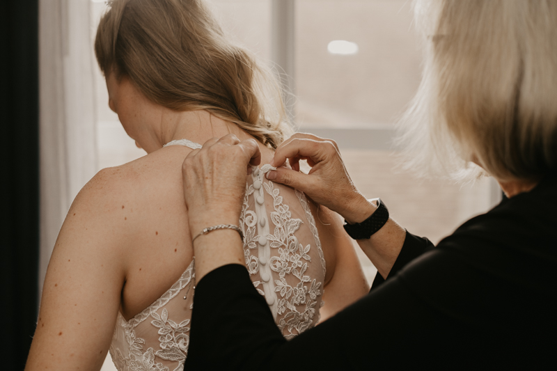 A bride getting ready for her wedding at the Vineyards of Mary's Meadow in Darlington, Maryland by Britney Clause Photography