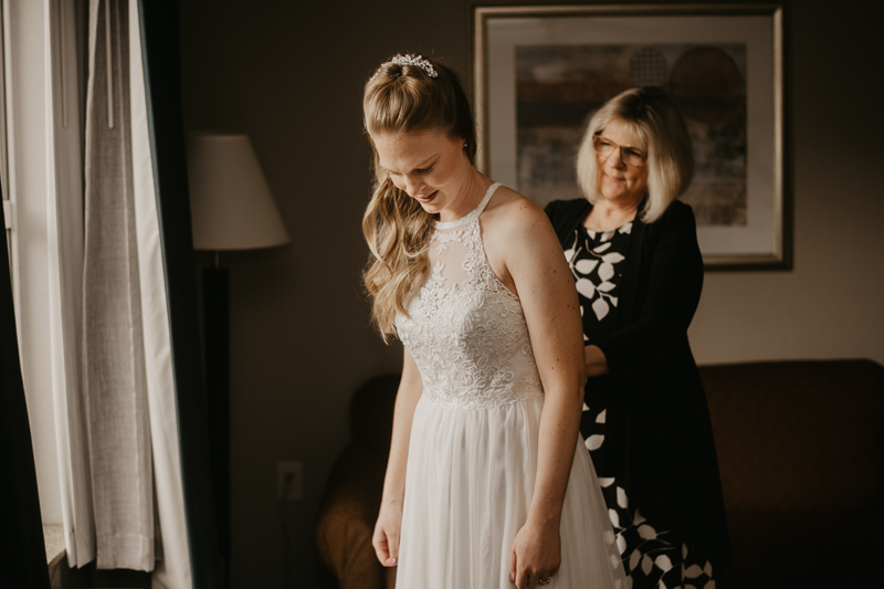 A bride getting ready for her wedding at the Vineyards of Mary's Meadow in Darlington, Maryland by Britney Clause Photography