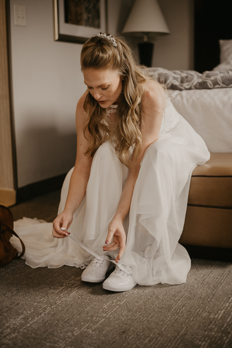 A bride getting ready for her wedding at the Vineyards of Mary's Meadow in Darlington, Maryland by Britney Clause Photography