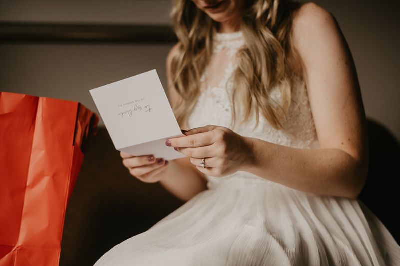 A bride getting ready for her wedding at the Vineyards of Mary's Meadow in Darlington, Maryland by Britney Clause Photography