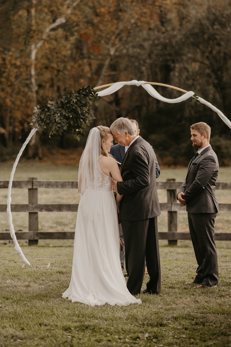 Amazing vineyard wedding ceremony at the Vineyards of Mary's Meadow in Darlington, Maryland by Britney Clause Photography