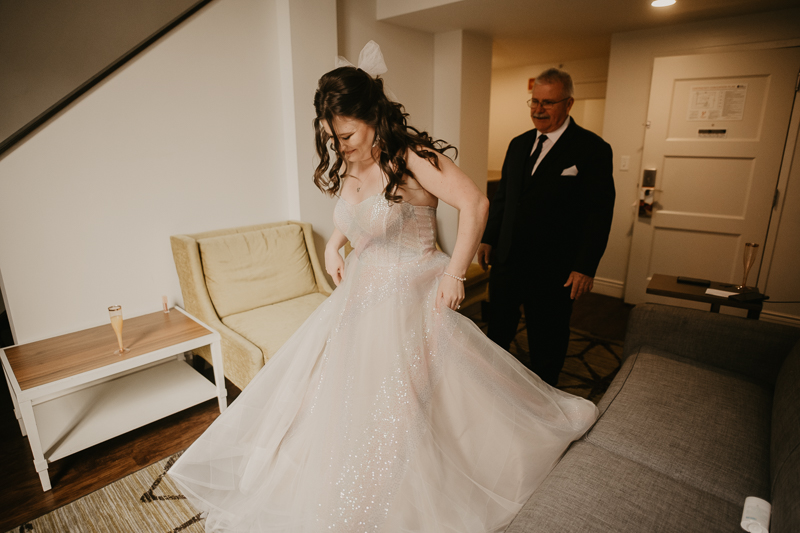 A bride getting ready at the Hotel Indigo for her Heron Room wedding in Baltimore, Maryland by Britney Clause Photography