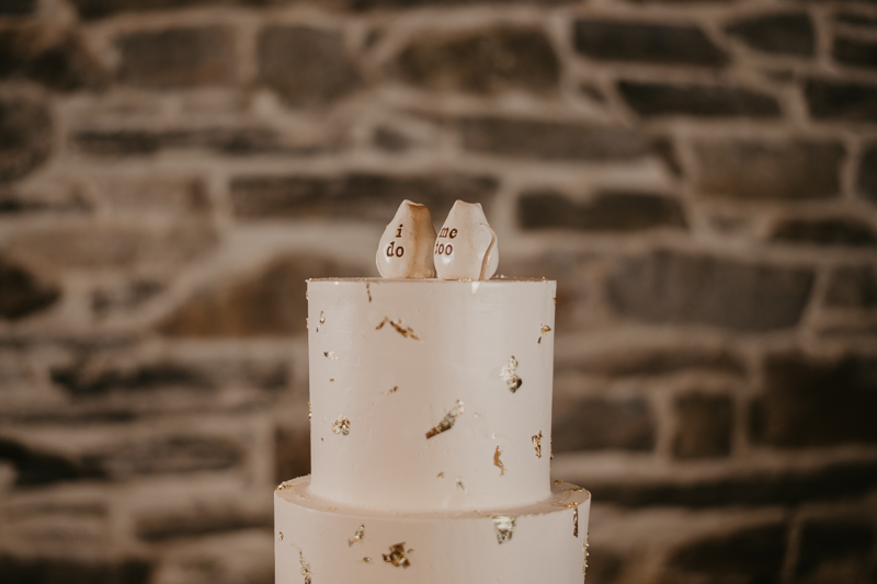 Delicious gold flecked wedding cake by Copper Kitchen at the Heron Room in Baltimore, Maryland by Britney Clause Photography