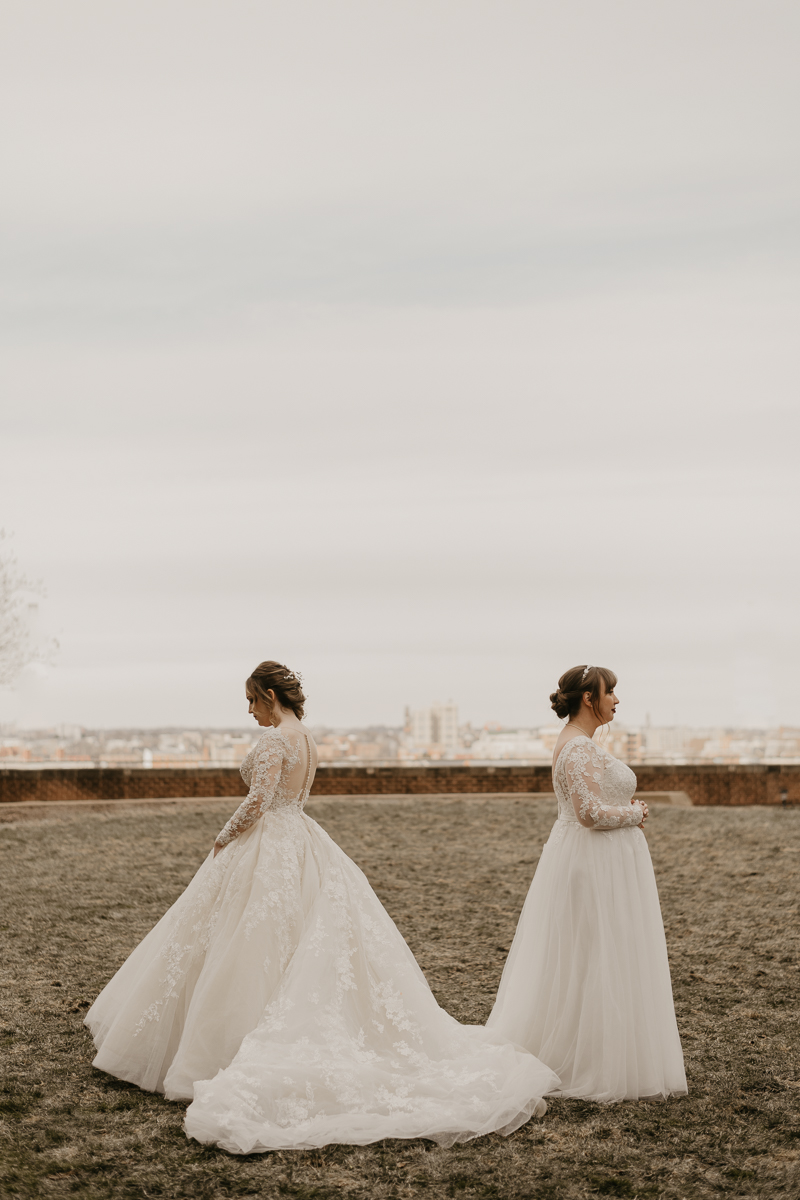 Stunning bride and bride wedding portraits at the Homewood Suites Hilton Hotel for a Mt. Washington Mill Dye House in Baltimore, Maryland by Britney Clause Photography