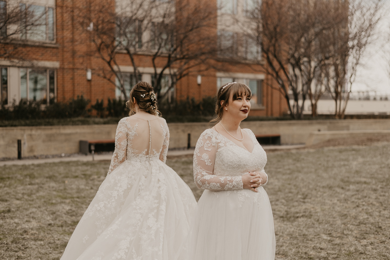 Stunning bride and bride wedding portraits at the Homewood Suites Hilton Hotel for a Mt. Washington Mill Dye House in Baltimore, Maryland by Britney Clause Photography