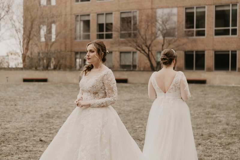 Stunning bride and bride wedding portraits at the Homewood Suites Hilton Hotel for a Mt. Washington Mill Dye House in Baltimore, Maryland by Britney Clause Photography