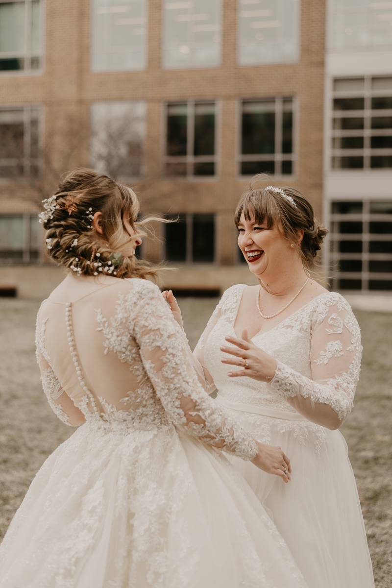 Stunning bride and bride wedding portraits at the Homewood Suites Hilton Hotel for a Mt. Washington Mill Dye House in Baltimore, Maryland by Britney Clause Photography