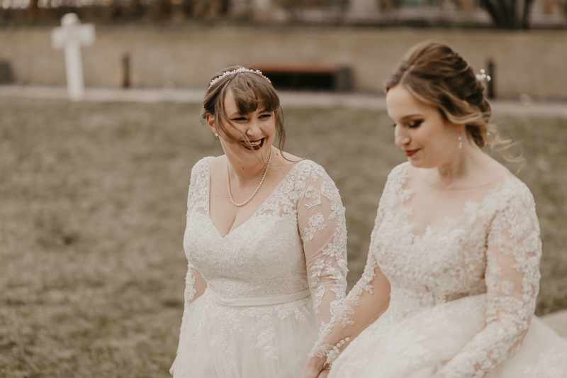 Stunning bride and bride wedding portraits at the Homewood Suites Hilton Hotel for a Mt. Washington Mill Dye House in Baltimore, Maryland by Britney Clause Photography