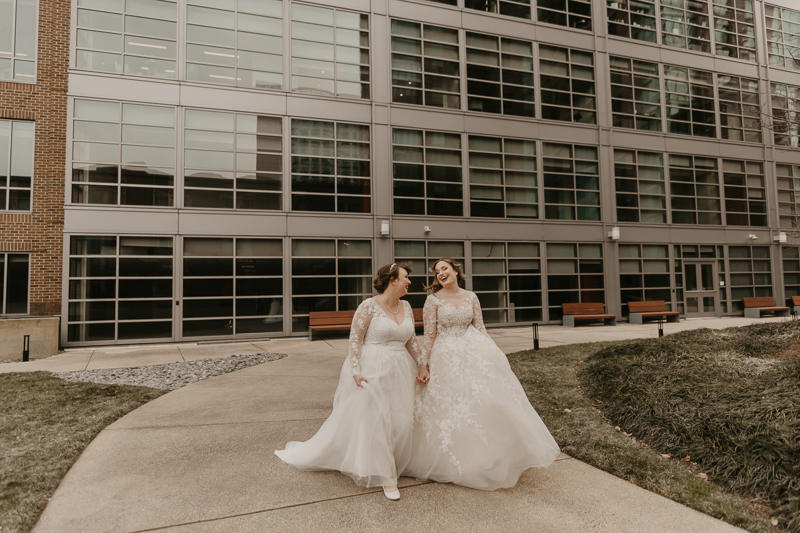 Stunning bride and bride wedding portraits at the Homewood Suites Hilton Hotel for a Mt. Washington Mill Dye House in Baltimore, Maryland by Britney Clause Photography