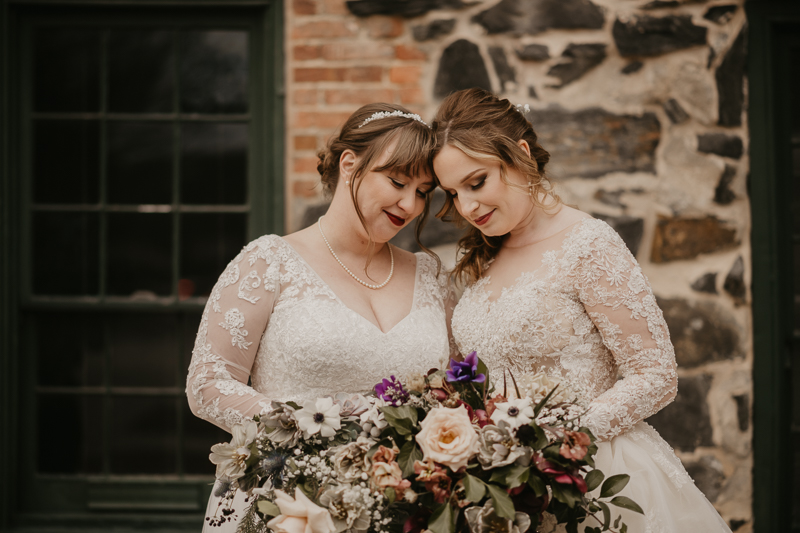 Stunning bride and bride wedding portraits at the Mt. Washington Mill Dye House in Baltimore, Maryland by Britney Clause Photography