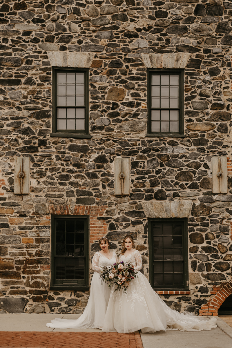 Stunning bride and bride wedding portraits at the Mt. Washington Mill Dye House in Baltimore, Maryland by Britney Clause Photography