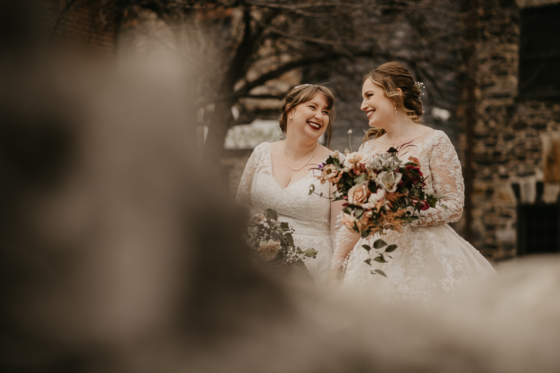 Stunning bride and bride wedding portraits at the Mt. Washington Mill Dye House in Baltimore, Maryland by Britney Clause Photography