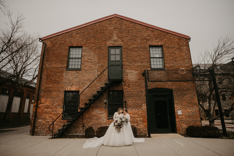 Stunning bride and bride wedding portraits at the Mt. Washington Mill Dye House in Baltimore, Maryland by Britney Clause Photography