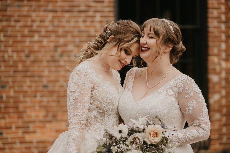 Stunning bride and bride wedding portraits at the Mt. Washington Mill Dye House in Baltimore, Maryland by Britney Clause Photography