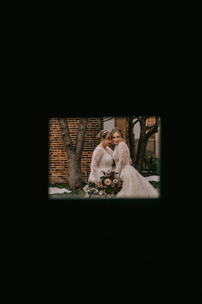 Stunning bride and bride wedding portraits at the Mt. Washington Mill Dye House in Baltimore, Maryland by Britney Clause Photography