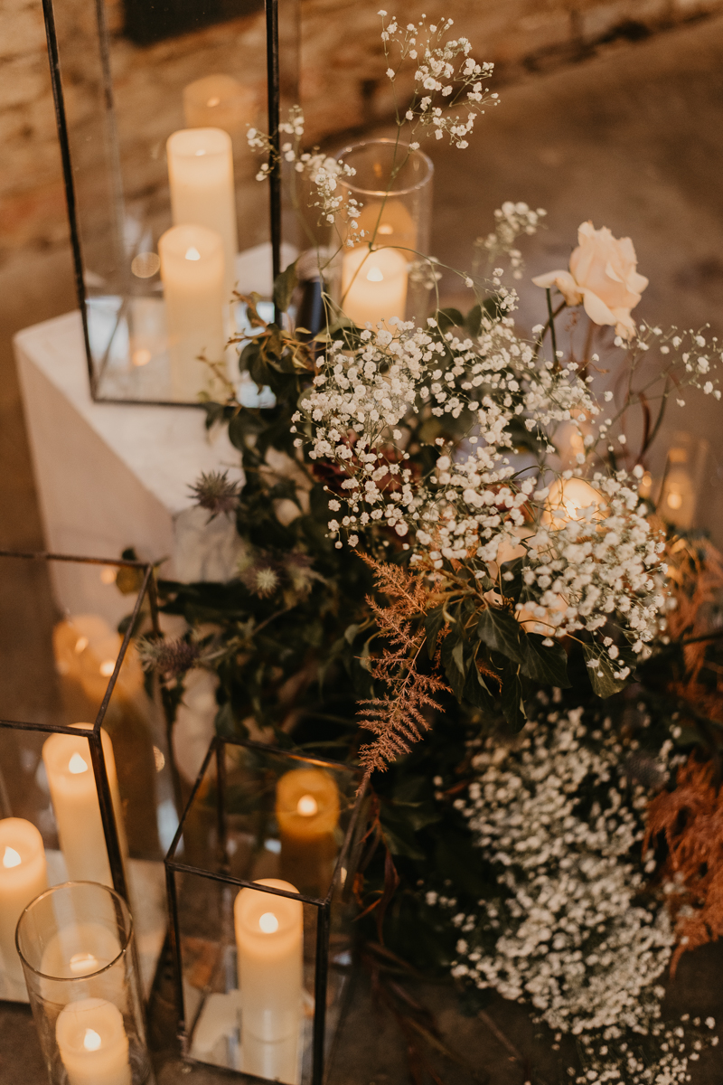 Amazing suspended wedding ceremony florals by Steel Cut Flower Co. at the Mt. Washington Mill Dye House in Baltimore, Maryland by Britney Clause Photography